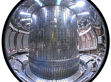 Interior of the Alcator C-Mod tokamak at the MIT Plasma Science and Fusion Center. Two Ion Cyclotron Range of Frequencies (ICRF) antennas are visible to the left of the central column. A new magnetic field-aligned ICRF antenna is visible to the right of the central column. (Source: Mike Garrett, Wikipedia.org) Interior of the Alcator C-Mod tokamak at the MIT Plasma Science and Fusion Center. Two Ion Cyclotron Range of Frequencies (ICRF) antennas are visible to the left of the central column. A new magnetic field-aligned ICRF antenna is visible to the right of the central column. (Source: Mike Garrett, Wikipedia.org)
